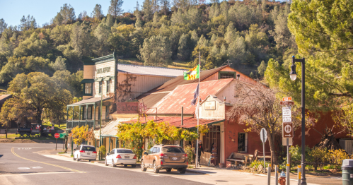 Looking down a quiet, small main street in Coulterville, CA.