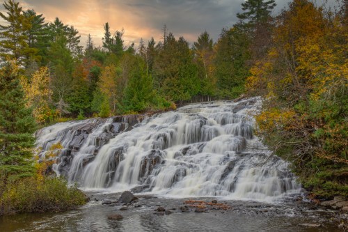 Photo source: https://www.gettyimages.com/detail/photo/scenic-view-of-waterfall-in-forest-during-autumn-royalty-free-image/1320171677 Scenic view of waterfall in forest during autumn,Ontonagon,Michigan,United States,USA