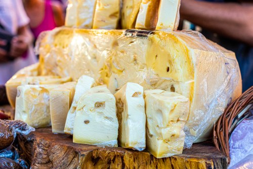 A variety of cheeses for sale