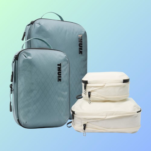 Two Thule travel bags in blue and white, featuring a sleek design, against a gradient background.