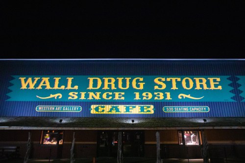 Exterior sign that says "Wall Drug Store"