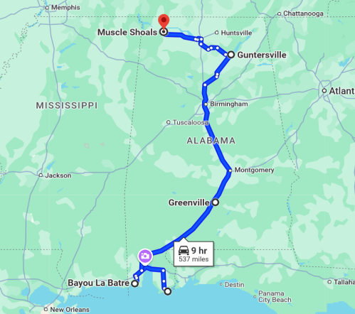 Map showing a route from Muscle Shoals to Bayou La Batre, Alabama, with a travel time of 9 hours and 537 miles.