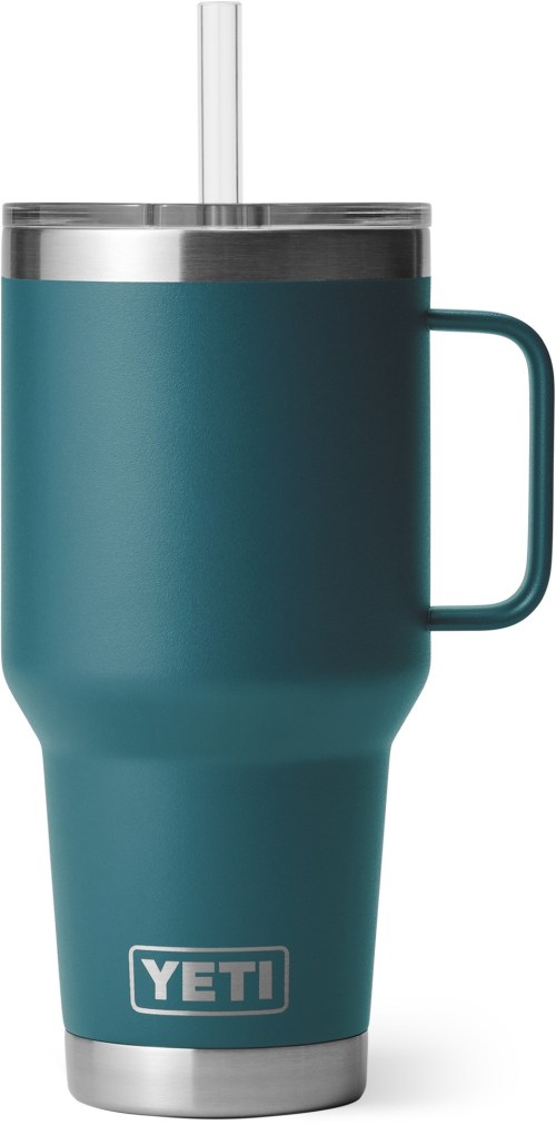 A teal YETI tumbler with a stainless steel lid and straw, featuring a sturdy handle.
