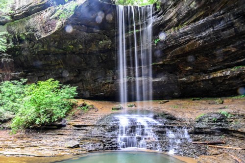 The beautiful flow of Northrup Falls plunging from above and creating a cascade before ending in a glistening pool.