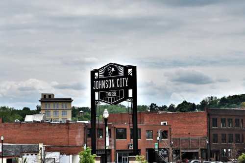 A large Johnson City Tennesse sign amidst the city skyline.