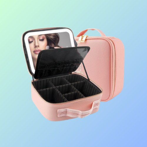 A pink cosmetic case with a mirror and divided compartments, set against a gradient background.