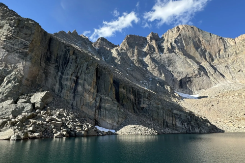 A sunny view of Chasm Lake in Rocky Mountain National Park in Colorado.