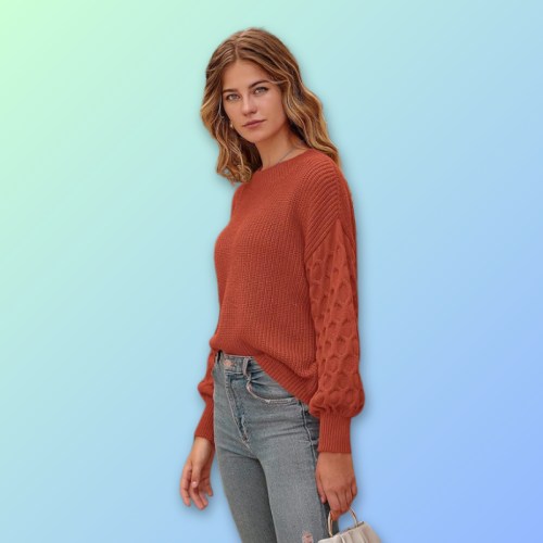 A young woman in a rust-colored sweater and jeans poses against a gradient blue background.
