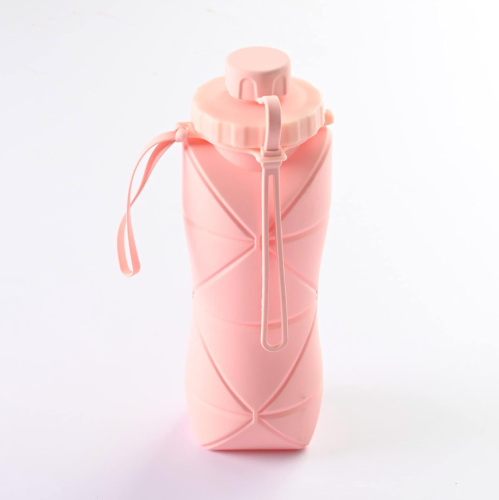 A pink, flexible water bottle with a twist-off lid and a carrying strap, featuring a textured design.