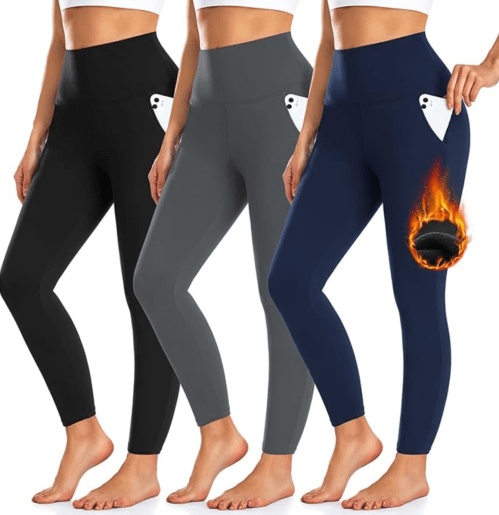 Three pairs of high-waisted leggings in black, gray, and navy, featuring pockets and a flame design on the navy pair.