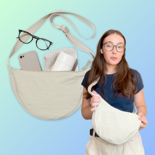 A woman holds a beige crossbody bag with glasses, a phone, and a water bottle visible inside. Background is gradient.