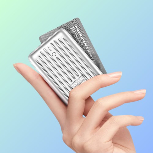 A hand holding a sleek, silver cardholder with a credit card partially visible against a gradient background.