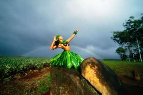 Native Hawaiian dressed in traditional Hula clothing