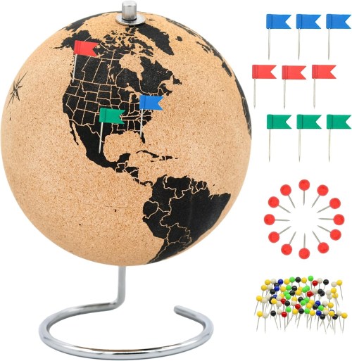A cork globe with map outlines, featuring colored flags and pins for marking locations, on a metal stand.