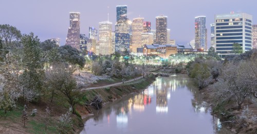 view of the houston city skyline at twilight in winter