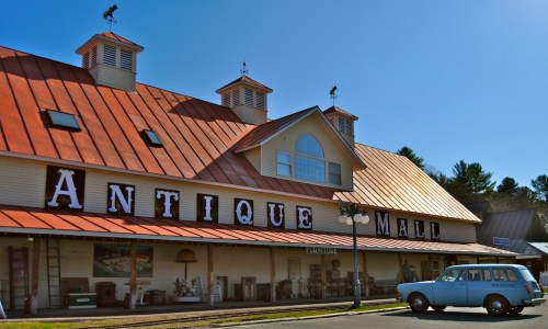 Outside of Vermont Antique Mall in Quechee, Vt. Sign reads "Antique