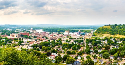 Multi-shot panorama looking east across Red Wing and the Mississippi from an elevated vantage.
