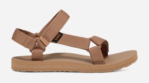 A tan sandal with adjustable straps and a textured sole, designed for comfort and outdoor use.