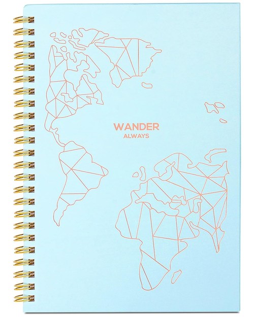 A light blue notebook with a geometric world map design and the words "WANDER ALWAYS" in orange.