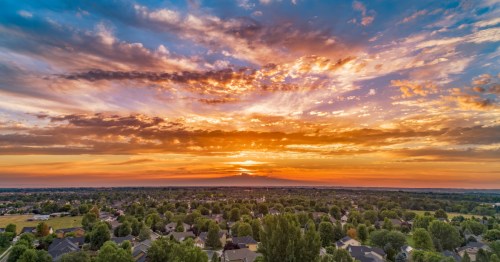 A fiery sunset is above Caldwell, Idaho, and the surrounding Treasure Valley towns.
