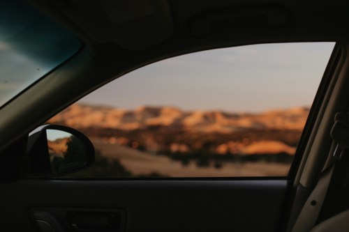 Image of scenery outside a car window