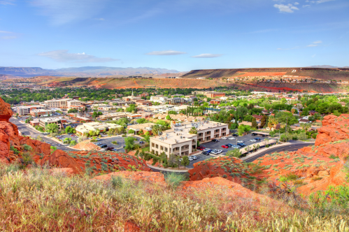 bird's-eye view of st. george utaj surrounded by mountains in southwestern utah