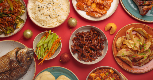 Vibrant Chinese traditional dishes on a festive red background.