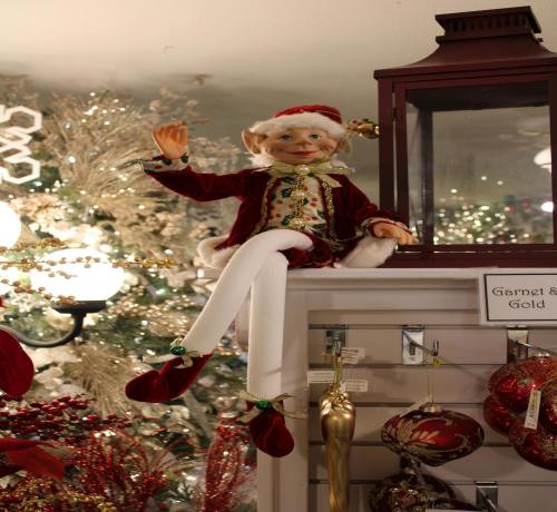 elf-figure-sitting-on-a-holiday-shelf