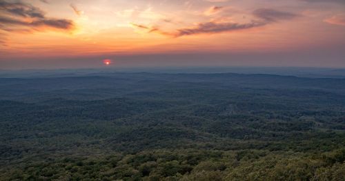 the sunset over the mountains at Cheaha State Park in Alabama