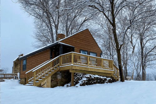 Exterior of a snow-covered cabin in Virginia