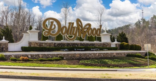 the Dollywood sign at the front of the amusement park in Pigeon Forge, Tennessee, during a sunny day