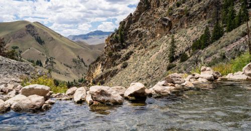 the view from Goldbug Hot Springs in Idaho with mountains in the background