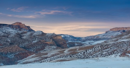 Hideout Ranch in Shell, Wyoming covered in snow at dusk