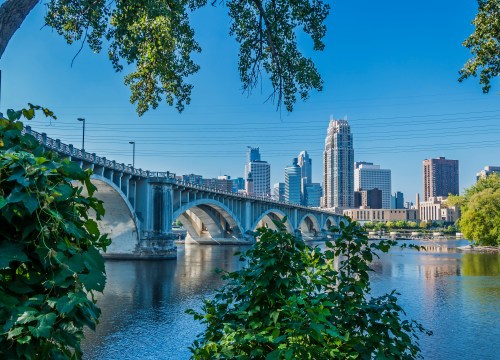 View of the Third Avenue Bridge and St. Anthony Main along the Mississippi River in Minneapolis