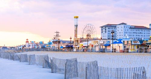 sunset view of amusement park ride on the boardwalk in Ocean City, New Jersey