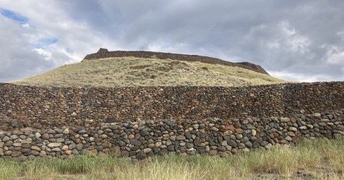 The massive stone ruins of Puʻukoholā Heiau, a sacred Hawaiian temple built of hand-carried lava rocks.