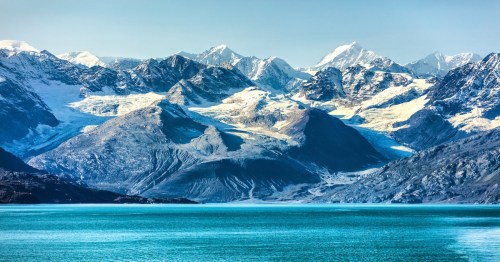 Glacier Bay cruise - Alaska nature landscape. Glacier Bay National Park in Alaska, USA. Scenic view from cruise ship vacation Alaska travel showing mountain peaks and glaciers.