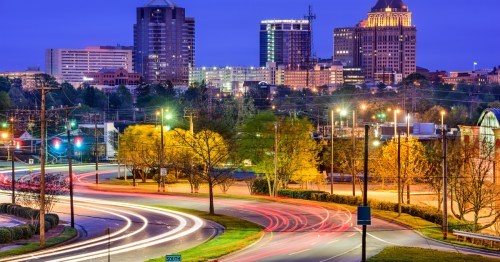 The Greensboro, North Carolina skyline at night.
