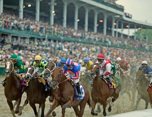 Thoroughbred horses racing at the Kentucky Derby with jockeys in colorful silks.