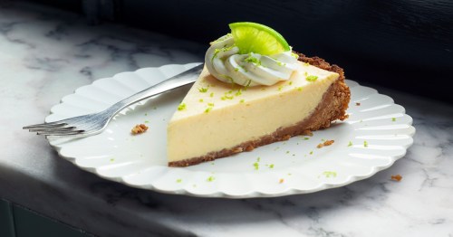 a slice of key lime pie on a plate