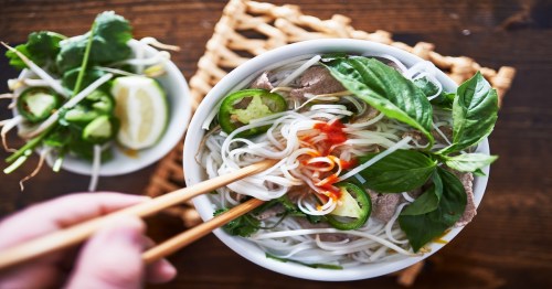 vietnamese pho with spicy sriracha sauce shot