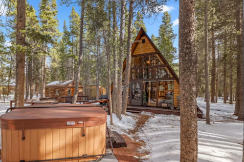 Exterior of A-frame Airbnb cabin with hot tub in Black Hawk, Colorado