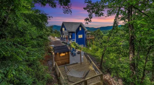 Blue house vacation rental perched in the mountains