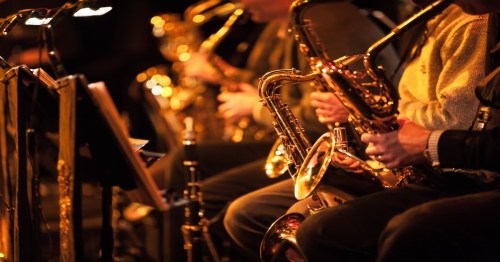 Big Band saxophone section. A candid view along the saxophone section of a big band in concert.