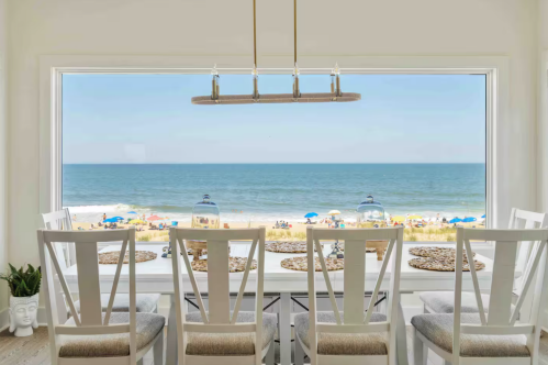 Ocean view from a dining room at a Dewey Beach Delaware Airbnb. 