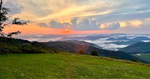 A beautiful sunset over the mountains in West Virginia from an Airbnb.