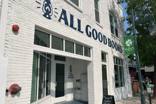 Exterior of All Good Books, a white brick building in South Carolina