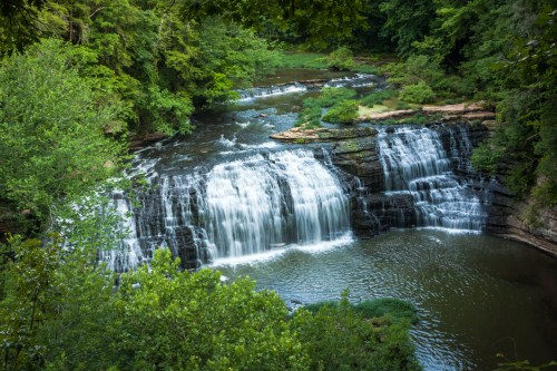 High-angle view captures Burgess Falls plunging into rocky Tennessee gorge