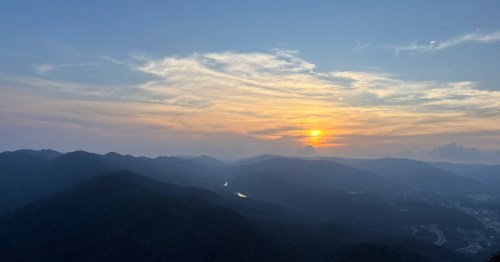 A sunset over the mountains on a hiking trail in Cumberland Gap National Historical Park.