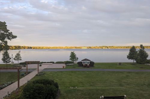 A landscape view of a lake and grassy shoreline.